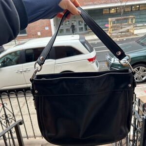 Coach handbag. Brand new. Gifted and never used.